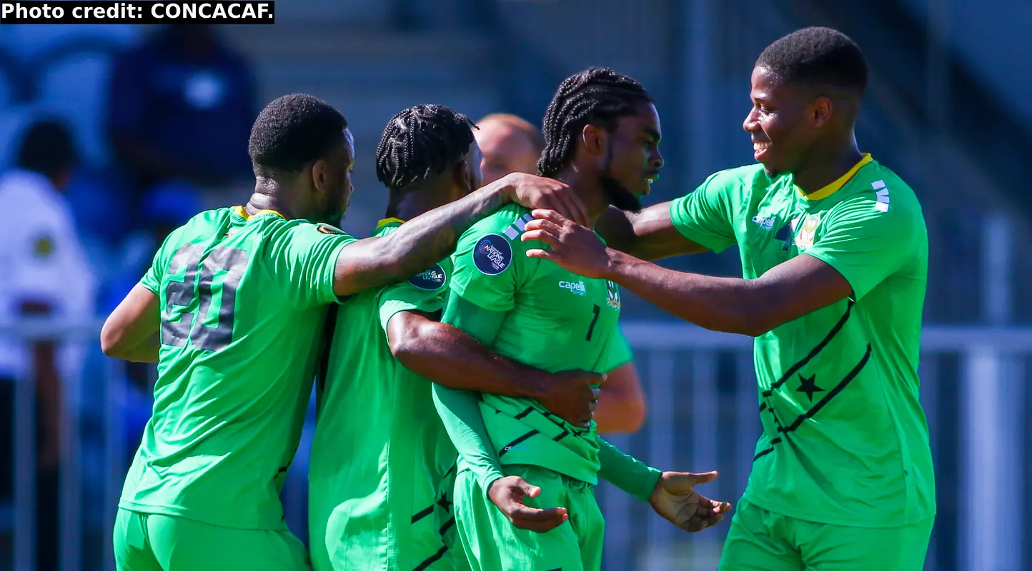 Saint Kitts and Nevis players celebrate a goal against Saint Martin