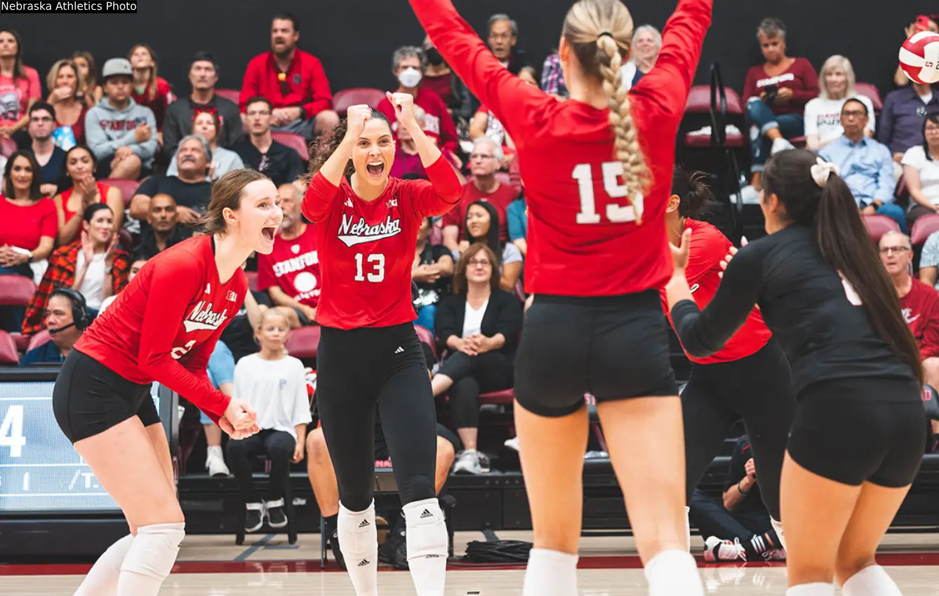 Nebraska college women's volleyball players celebrate